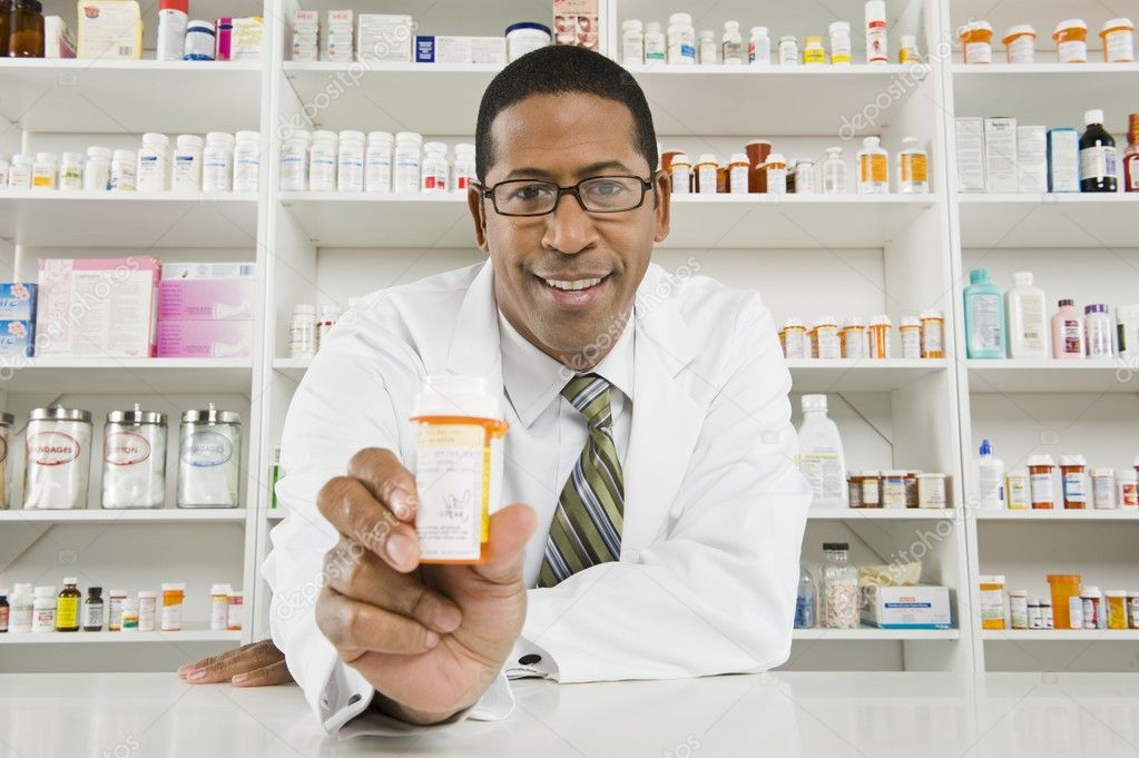 Pictures Pharmacists Working Male Pharmacist Working In Pharmacy 