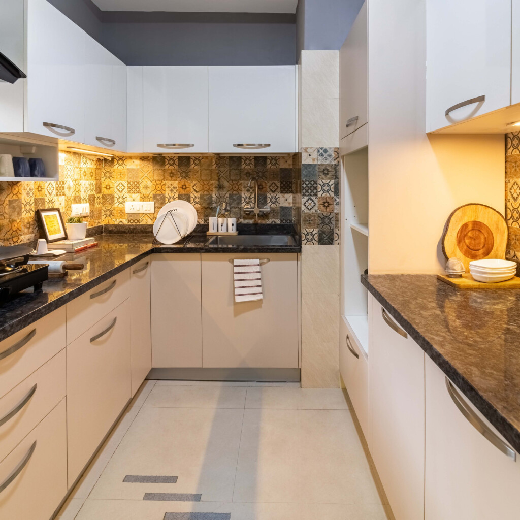 Spacious L Shaped Modular Kitchen Design With Champagne And White Toned 